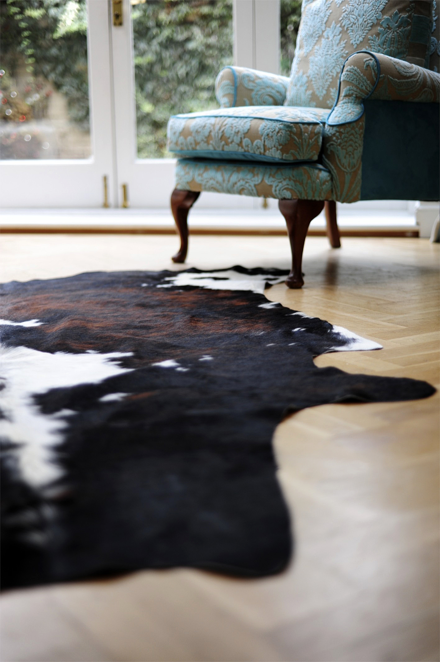 Create A New Look With An Animal Skin Rug City Cows